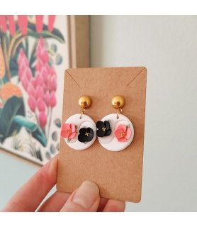 Boucles d'oreilles blanches...